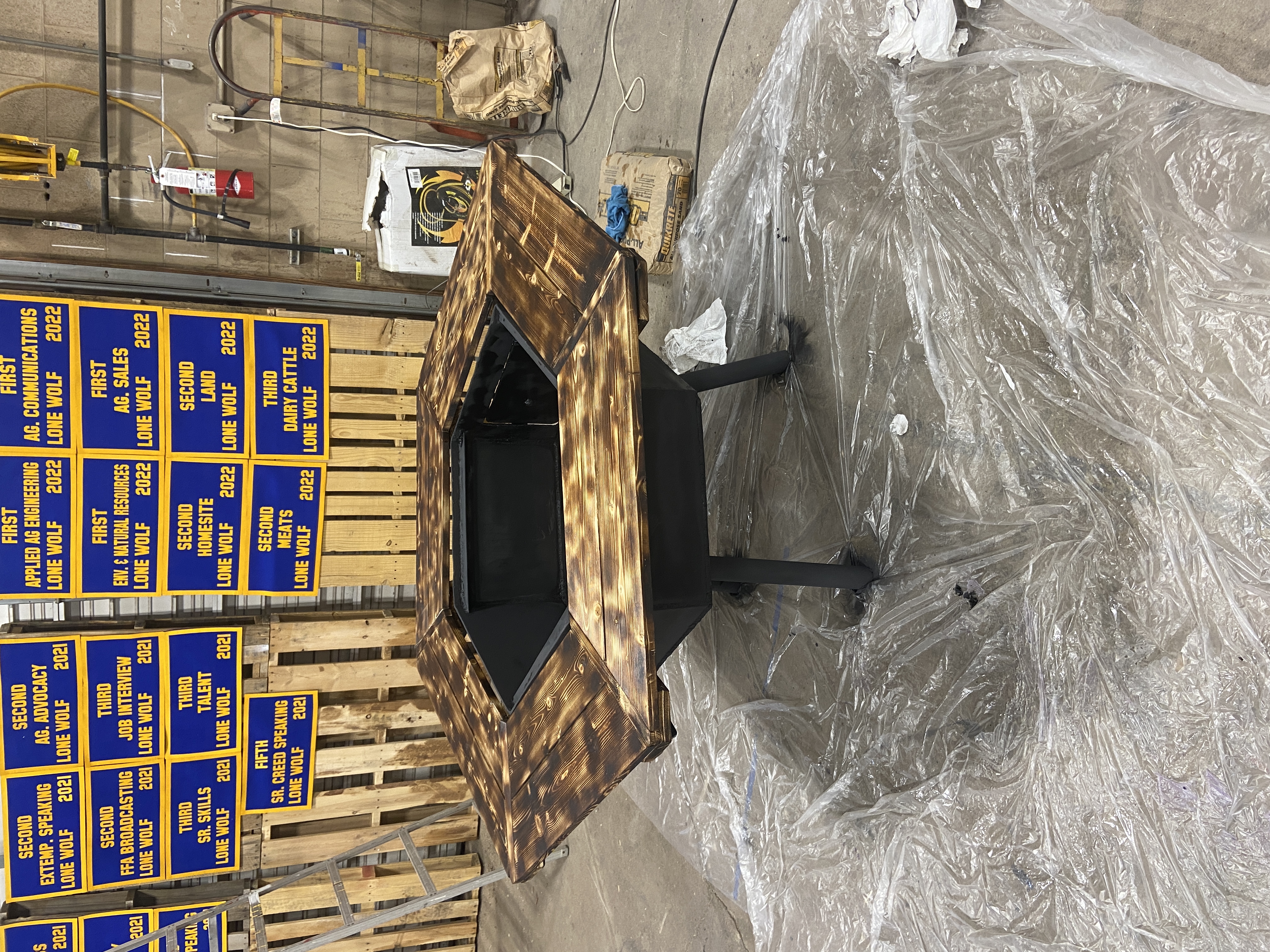 A table with a fire pit in the middle